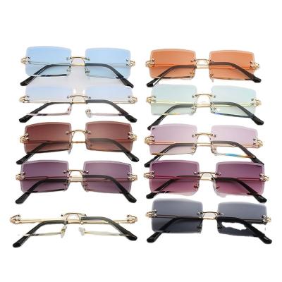 China 2021 Fashion Sunglasses Style The New Square Small Rectangle Sunglasses Rimless Sun Glasses Shading Hot Sales for sale