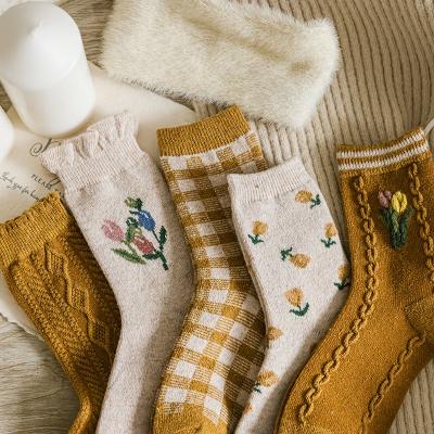 China Retro Breathable Thick Tulip Medium Tube Socks Warm Ladies Long Socks Winter Fashionable Socks For Women for sale