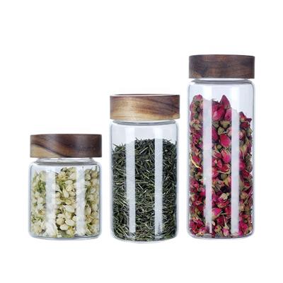 China Health and Heat Resistance Good Quality Factory Storage Glass Clear Jar Wooden Lid Directly for Food Stackable Airtight for sale