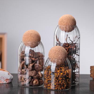 China Freshness Preservation China Manufacturer Direct Sale Glass Storage Jars With Cork Kitchen Glass Bottle Tea Jar Storage Wooden Bottle for sale