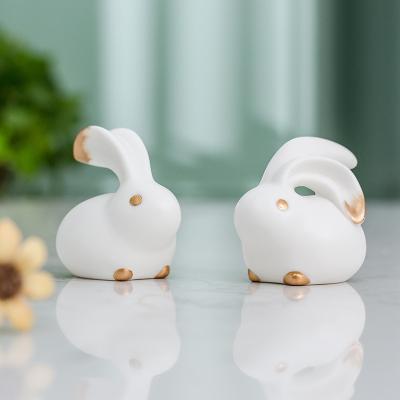 China Lucky Goods White Rabbits Minimalist Creative Minimalist Japanese Standard Desktop Shelf with Gold Rim Porcelain Opens Decoration for sale