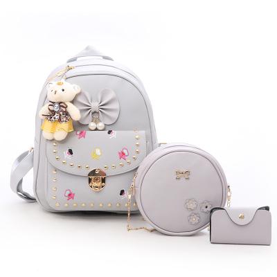 China Quality Korea PU Bow Leather Women Waterproof Custom Small Bear 3 Pcs Backpack School Bag Set With Lock for sale