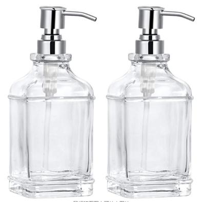 China Viable Antique Design 18Oz Thick Glass Shampoo With Rustproof 304 Stainless Steel Pump Hotel Soap Dispenser for sale