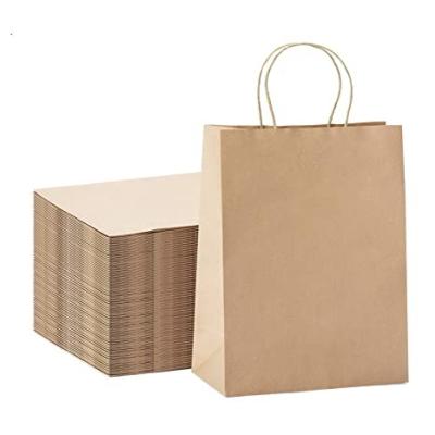 China Brown Customized Biodegradable Shopping Gift Carrier Kraft Paper Packaging Bag With Handle for sale