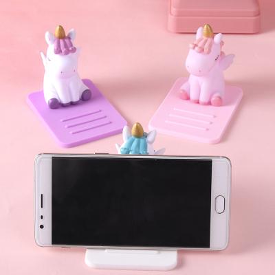 China Cute Waterproof PVC Soft Silicone Cartoon Unicorn Car Holder Desktop Adjustable Phone Holder Lazy Mobile Phone Holder for sale