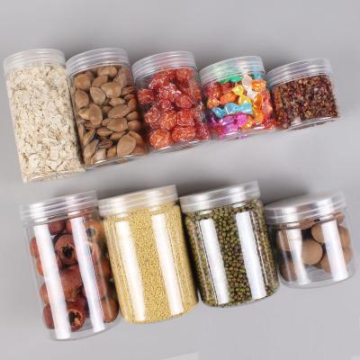 China Clear Plastic Storage Jar Portable Empty PET Food Jar with Aluminum Screw Top for Candy Cookies Jar for sale