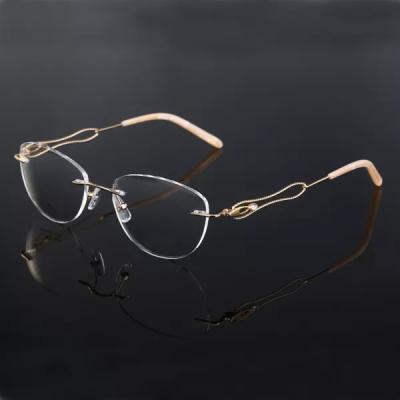 China New Fashion Women's Reading Glass Rimless Titanium Eyeglasses Frame With Leg Design Special Fancy Spectacle Frames for sale