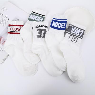 China Fashion Disposable Sports Tube Socks Cotton Crew Letter Socks Letter Sports Bamboo Socks for sale