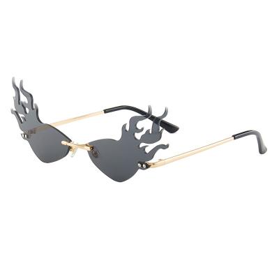 China Fashion sunglasses the new flame styling cut-edge sunglasses fashion street pat exposure metal cool rimless sunglasses for sale