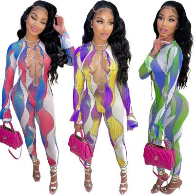 China Hot Sale Breathable Ruffle Sleeves 1 Piece Jumpsuit Women Printed To Bandage Sexy Long Sleeve Cavity Jumpsuit for sale