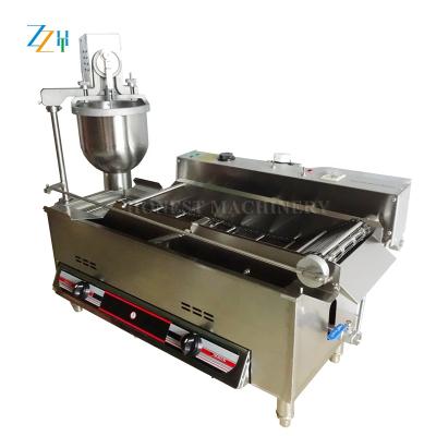 China Snack factory best quality machines for making donuts / full automatic donut machine for sale