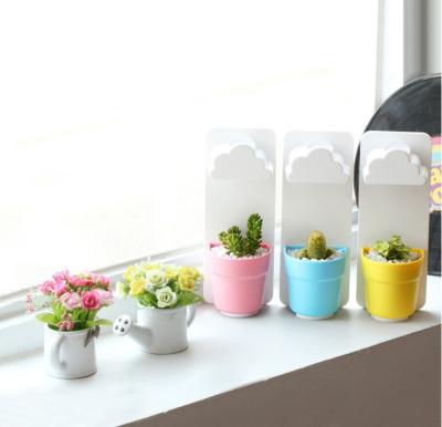 China Eco-friendly Tiny Wall Plastic Rainy Flower Pot With Water Filter Flower Pot Self Watering Cloud Shaped Rainy Hanging Pot Product for sale