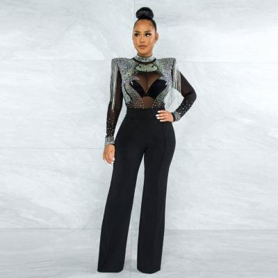 China 2022 QUICK DRY transparent women's sexy jumpsuit JY033 tassel sequin jumpsuit long sleeve for women for sale