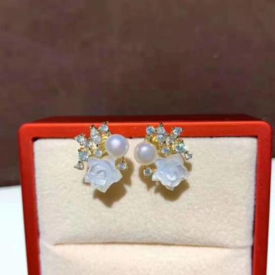 China Women's earring design the latest handmade silver imperfect natural freshwater baroque pearl jewelry elegant pearl earrings for sale