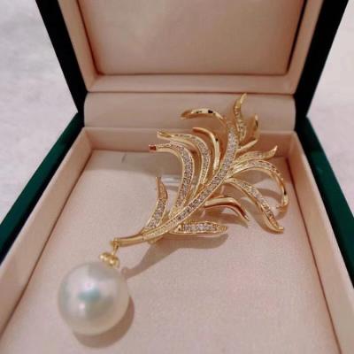 China Fashion Brooch Fashion Jewelry Noble Leaf Shaped Brooch Feather Dress Suit Long Thin Pearl Brooch For Women for sale