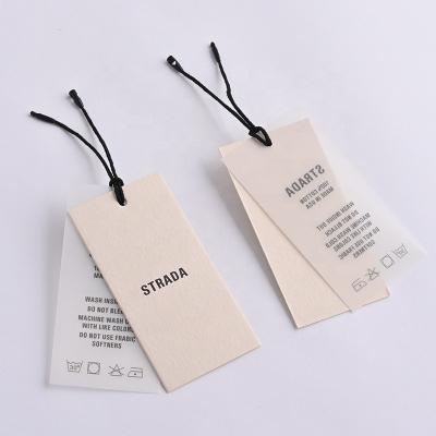 China Sustainable Custom Garment Paper Hangtags frosted Transparent PVC printed hang tag with hole for sale