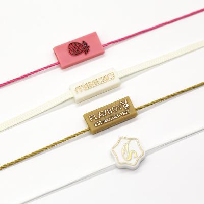 China Sustainable Custom luxury hangtag rope clothing polyester g string product seal string with embossed logo plastic seal hang tag string for sale