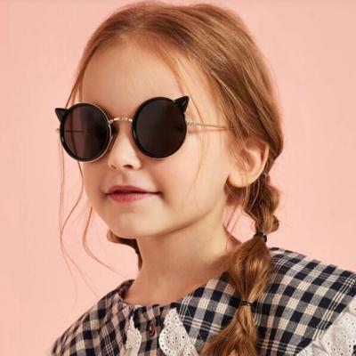 China Fashion Sunglasses Shape Sunglasses 2020 New Fashion Wholesale Girls Cute Sun Glasses Around Cat Ear Shaped Kids Children Sunglasses for sale