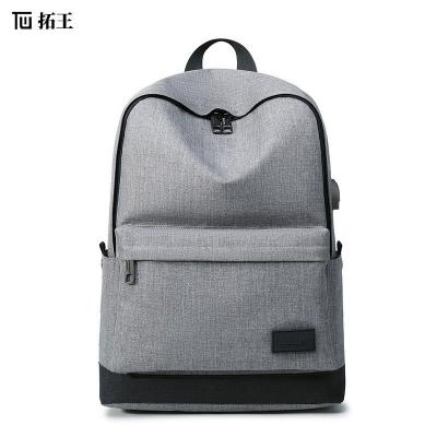 China With USB backpack men's leisure travel with USB charging high school and college student school bag multifunctional waterproof fabric for sale