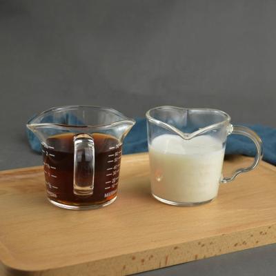 China Factory viable wholesale Double-said milk measuring cup household ounce glass thickened lip cup 70ml for sale