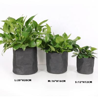 China Custom Waterproof Kraft Paper Washable Planter Flower Waterproof Washable Bag for sale