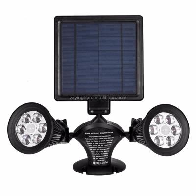 China Upgraded Double Head Solar Powered Garden Double Spotlights 12 LED Solar Garden Light Outdoor for sale