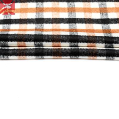 China Sustainable Custom Made High Quality Wool Polyester Plaid Check Fabric For Winter Garment for sale