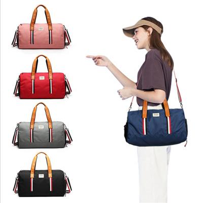 China Custom Fashion Weekend Gym Sports Travel Canvas Duffle Bag Foldable Waterproof Gym Travel Bag for sale