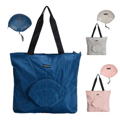 China NATIONAL Memory Rotating Shopping Bag Tote Bag Shell Design Travel Material Waterproof And Dustproof Foldable Bag for sale