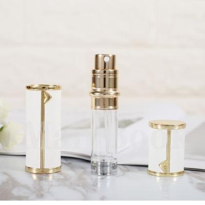 China Lurury Perfume Atomizer Bottle Aluminum Bottom Filled Leather Aluminum Bottles Spray Mini Parfum Glass Metal Round Perfume Bottle for sale