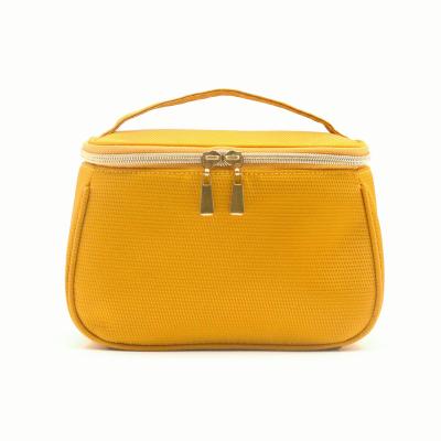 China Eco-friendly Bright Yellow Daffodil Shape Minimized Trapezoid Shape Toiletry Bag Fabric rPET Cosmetic Bag Recycled Polyester Unisex Makeup Bag for sale