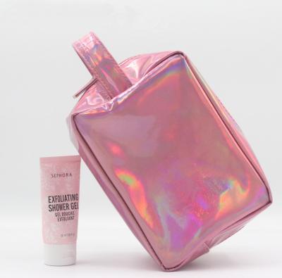 China Fashion Lightweight Holographic Vegan Travel Toiletry Bag Leather Cylinder Shape Portable Side Handle Pink PU Holographic Toiletry Bag for sale