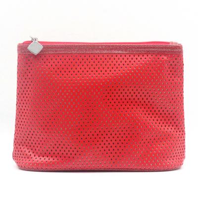 China 2022 Popular Classic Poinciana Red Hollow Design PU Water Based Cosmetic Bag for sale