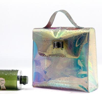 China Normcore/Exquisite Holographic Makeup Bag Minimalist Unique Design TPU With Handle Transparent Biodegradable Waterproof Laser TPU Cosmetic Bag for sale