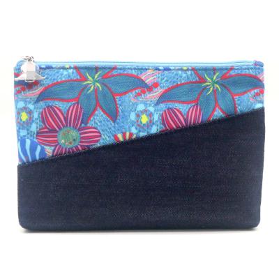 China Beautiful 2022 design makeup bag oxford fabric polyester fabric toiletry bag unique pattern exquisite floral blue denim washable cosmetic pouch for sale