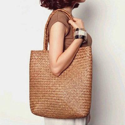 China Fashion flower basket large capacity portable straw woven travel beach bag hanging simple handbags for sale