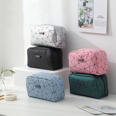 China Fashion Women Travel Cosmetic Bag Multifunctional Geometric Makeup Bags Waterproof Portable Toiletries Organizer Make Up Cases for sale