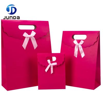 China Latest Design Recyclable Wholesale Drawstring Cute Paper Bag Packaging Paper Bags For Gift Wrapping for sale