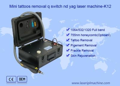 China Mini Portable Q switched ND YAG Laser Remove Tattoo Pigment Removal Machine for sale