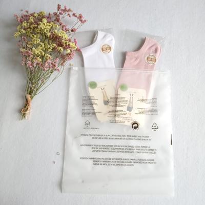 China Apparel Packaging Zip Lock Moisture Proof Biodegradable Custom Print Frosted Plastic Bag With Warning Logo for sale