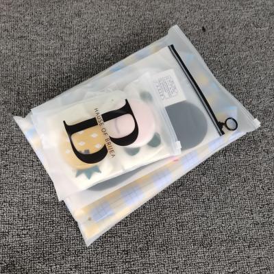 China Recyclable Custom Transparent Plastic Bag Zipper Lock Logo Slider Frosted Clothing Bags for sale