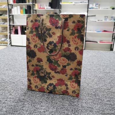 China Jewelry Gift Wholesale Moisture Proof Printing Customized Paper Bag For Clothes With Logo for sale