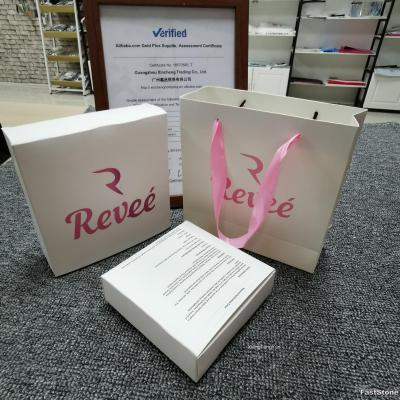 China Custom Logo Luxury Jewelry Romantic Pink Stain Bow Knot Ribbon Handle Moisture Proof Paper Bag for sale