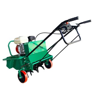 China Farms Gasoline Handheld Motorized Lawn Punching Machine Planting Breathing Grassroots And Breathable Punching Machine for sale