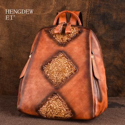 China Hengdewei Chinese style leather paste tree leather multifunctional women's backpack retro embossed backpack large capacity for sale