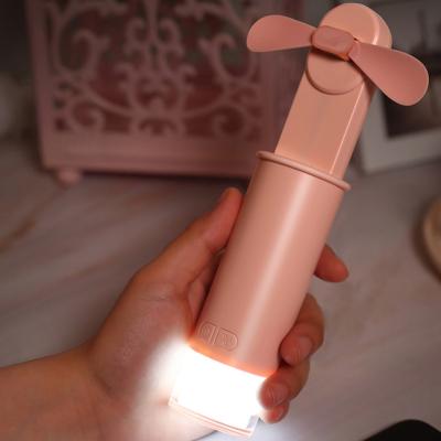 China Portable Handheld Cooling Mini Personal Fan Outdoor LED Light Battery Powered Retractable Blades / Retractable LED Light Base Free Sample for sale