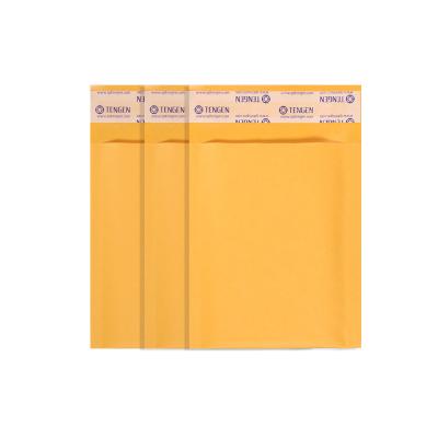 China Waterproof 110x130mm Yellow Kraft Paper Bubble Mailer Bags With Bubble Lined Padded Envelopes Mailing Bag for sale