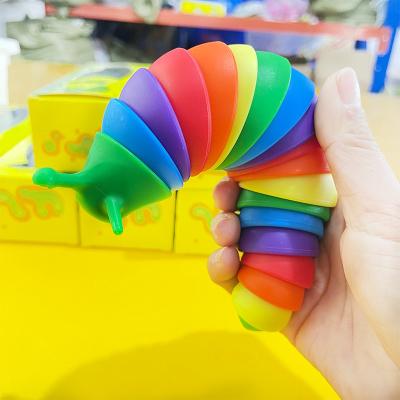 China Funny Educational Snail Relaxation Toy 18cm Rainbow Caterpillar Decompression Looper Toy 3D Wiggle Worm Ingot Toys for sale