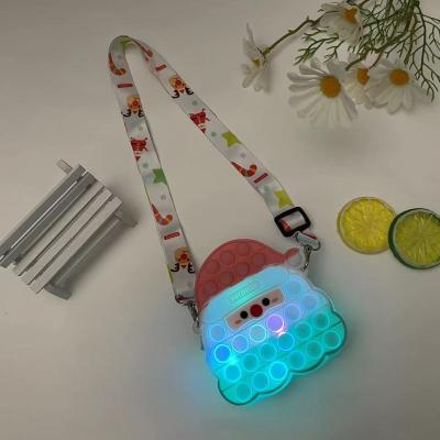 China Creative Toy Decompression Puzzle Santa Claus Silicone Bubble Bag Wallet New Funny Light Educational Bag Kids With LED Lights for sale