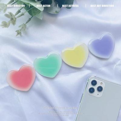 China New Epoxy Resin Phone Holder Adjustable Handle Heart Shaped Mobile Promotional Gifts Custom Phone Sockets for sale